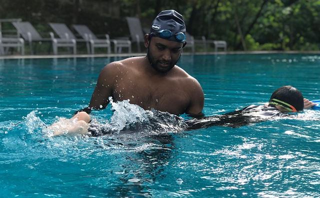 A child is having home swimming lessons hollywood florida